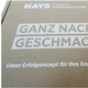 Kiste aus Braunpappe mit Deckweiß bedruckt